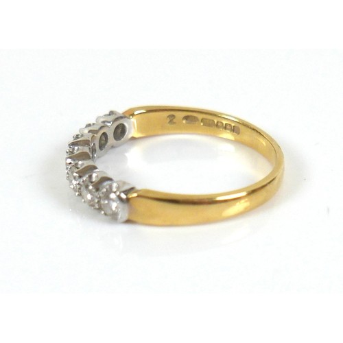 297 - An 18ct gold seven stone diamond ring, each round cut stone approximately 2.5mm diameter, size O, 2.... 