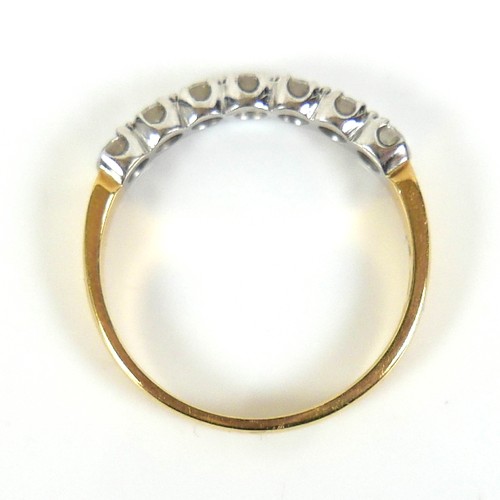 297 - An 18ct gold seven stone diamond ring, each round cut stone approximately 2.5mm diameter, size O, 2.... 