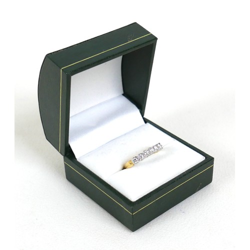 297 - An 18ct gold seven stone diamond ring, each round cut stone approximately 2.5mm diameter, size O, 2.... 