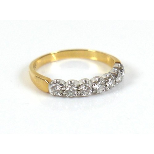 297 - An 18ct gold seven stone diamond ring, each round cut stone approximately 2.5mm diameter, size O, 2.... 