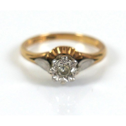 275 - An 18ct gold diamond solitaire ring, the round cut illusion set stone, approximately 2.5mm diameter,... 