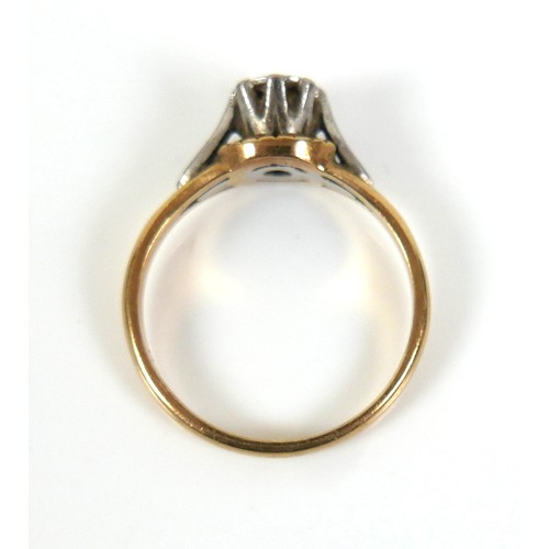 275 - An 18ct gold diamond solitaire ring, the round cut illusion set stone, approximately 2.5mm diameter,... 