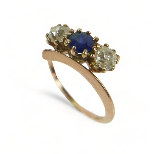 319 - A yellow gold diamond and sapphire three stone ring size M, each stone approximately 0.30ct.Weight 2... 