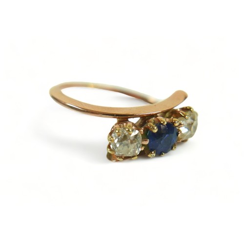 319 - A yellow gold diamond and sapphire three stone ring size M, each stone approximately 0.30ct.Weight 2... 