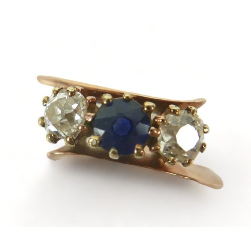 319 - A yellow gold diamond and sapphire three stone ring size M, each stone approximately 0.30ct.Weight 2... 