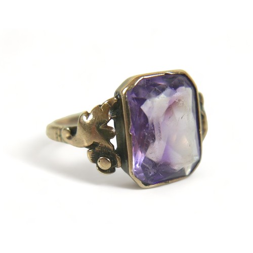 163 - An 8ct 333 yellow gold amethyst ring size N, head size 13mm by 10mm.