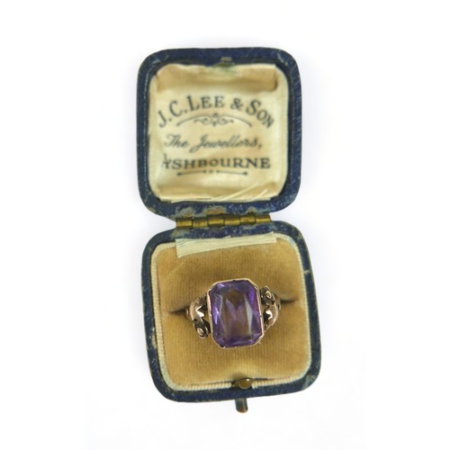 163 - An 8ct 333 yellow gold amethyst ring size N, head size 13mm by 10mm.