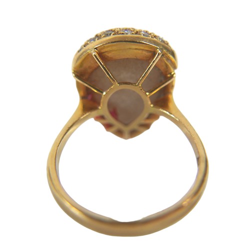 318 - An 18ct gold ring set with large pear-shaped pearl, approximately 12 by 15mm, sixteen small diamonds... 