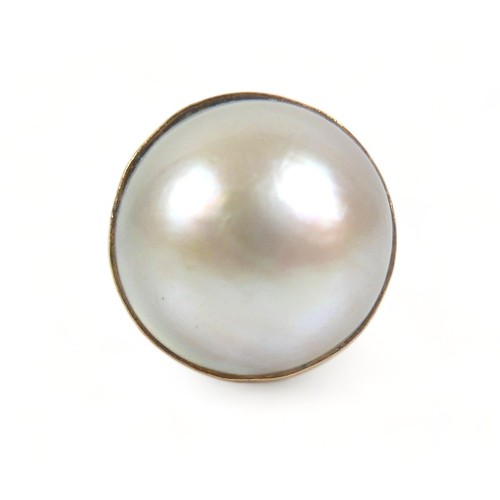 272 - A 9ct gold ring set with a large cabochon pearl, approximately 15 mm diameter, size K, 6.9g.