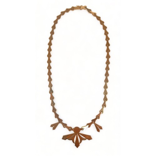 339 - An 18ct gold necklace with wishbone segments, with central ball and starburst design, marked 750, It... 