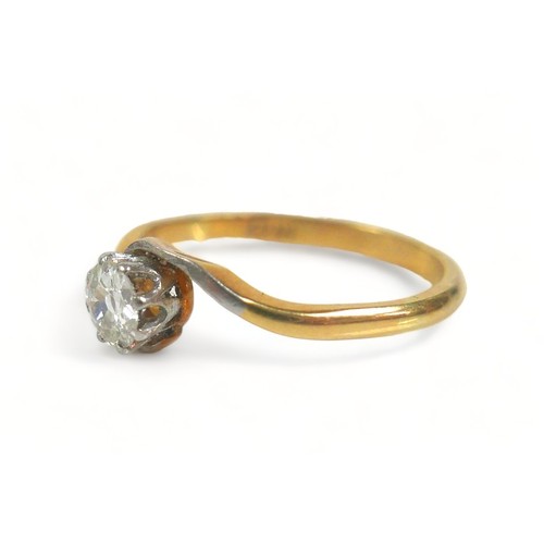 334 - A 18ct gold diamond solitaire ring, the central brilliant cut diamond, approximately 4.5mm diameter,... 