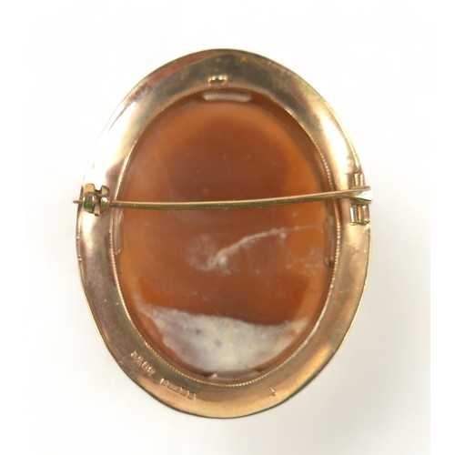 232 - A 9ct mounted cameo brooch, 40 by 10 by 50mm, 11.8.