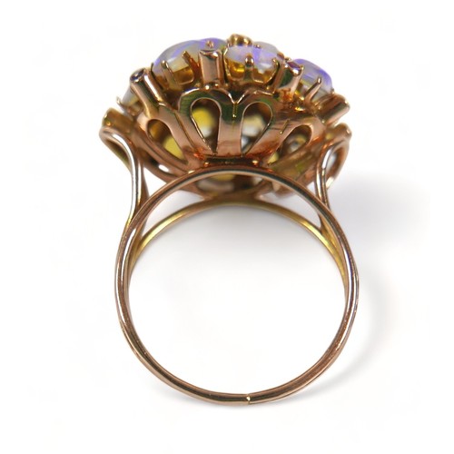 254 - A 14ct yellow gold opal, turquoise and garnet cluster ring, size O, 6.2 grams.