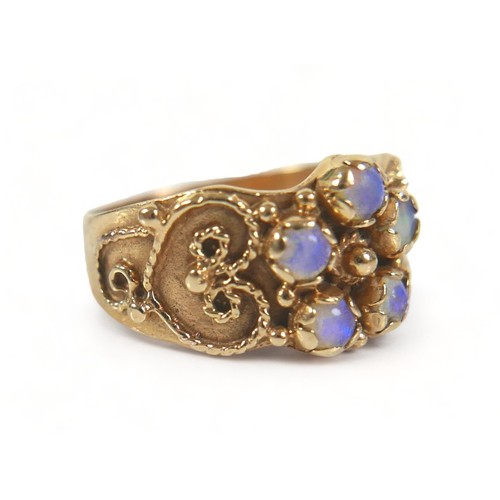 204 - A 14ct yellow gold opal ring size M, 3.9 grams.