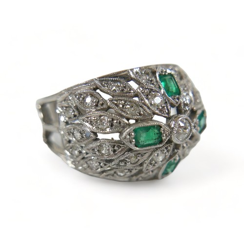 326 - An 18ct white gold emerald and diamond cluster ring, with 18ct white gold band and platinum setting,... 