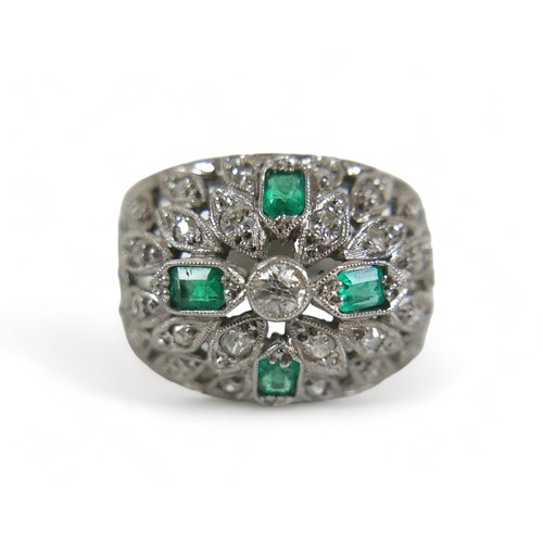 326 - An 18ct white gold emerald and diamond cluster ring, with 18ct white gold band and platinum setting,... 