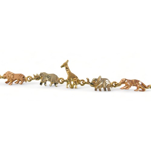 263 - An 18ct tri-colour gold bracelet, formed with five jungle animal figures, lion, rhinoceros, giraffe,... 