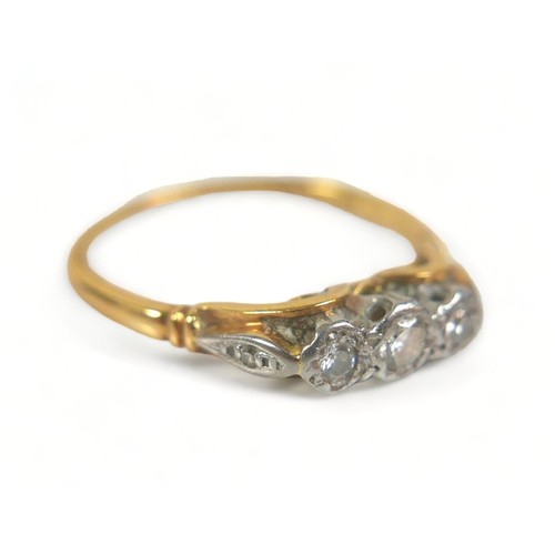 187 - An 18ct yellow gold ring, illusion set with three small diamonds, 4mm at widest, size L, 2.4g, toget... 