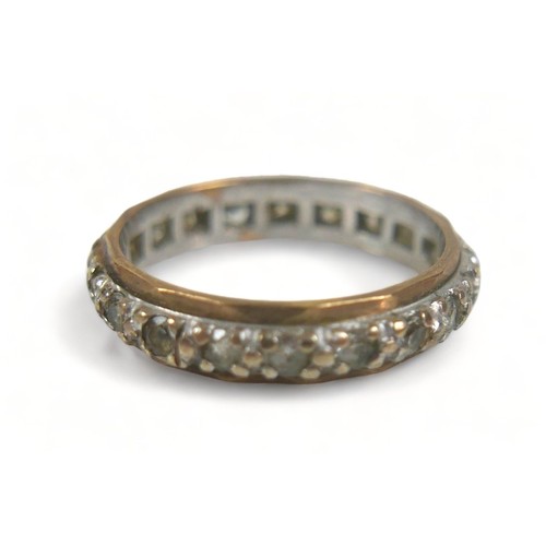 188 - An 18ct yellow gold gypsy ring, set with two (missing one) small diamonds, largest 2.5mm, size O/P, ... 