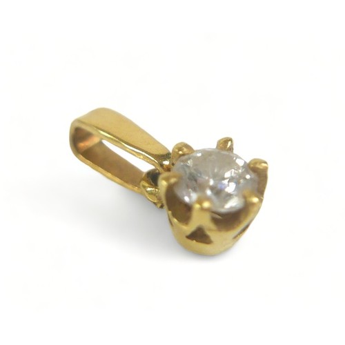 333 - An 18ct yellow gold and diamond solitaire pendant, the round faceted cut stone approximately 0.5ct.