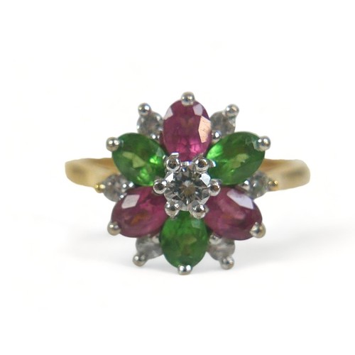 335 - An 18ct gold, diamond and tourmaline thirteen-stone flowerhead cluster ring, the central brilliant c... 