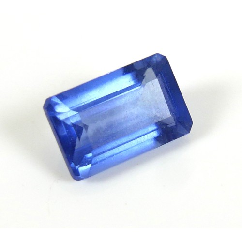 189 - A 9 carat loose emerald-cut blue tanzanite stone, heat treated, with certificate.