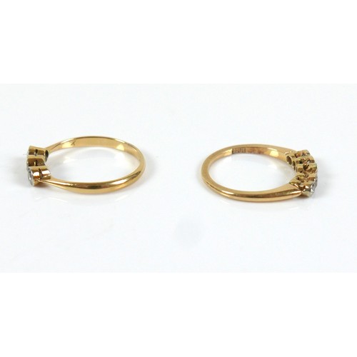 293 - Two 18ct gold and diamond rings, one set with three stones, two diamonds, one clear white stone, eac... 