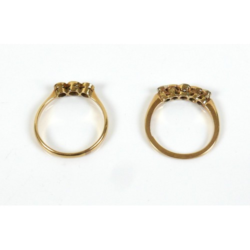 293 - Two 18ct gold and diamond rings, one set with three stones, two diamonds, one clear white stone, eac... 