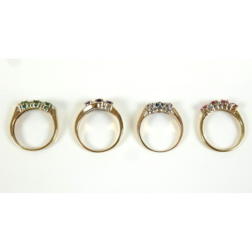 278 - A group of four 9ct gold and diamond rings, comprising a 9ct gold and green oval emerald stone ring ... 