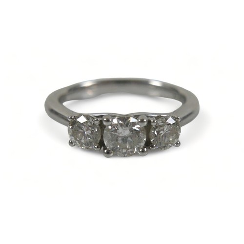 346 - A platinum three stone 1ct diamond ring, retailed by Goldsmiths, marked CT1.00 to inner shank, size ... 