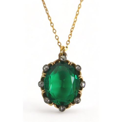 284 - A gilt metal diamond and green stone pendant on chain and matching earrings, each 15mm by 19mm, chai... 