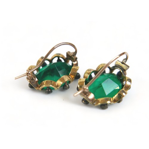 284 - A gilt metal diamond and green stone pendant on chain and matching earrings, each 15mm by 19mm, chai... 