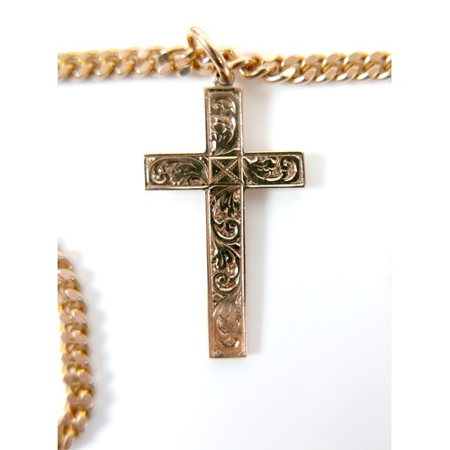 308 - A 9ct gold kerb link necklace, 3.5mm wide, 50cm long, with 9ct gold cross shaped pendant, with engra... 