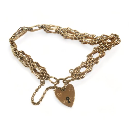 270 - A 9ct yellow gold gate link bracelet, with heart shaped padlock clasp, 19mm wide, 16cm long, 14.9g.