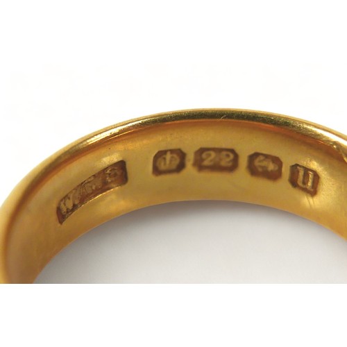 331 - A 22ct gold band, size M, 8g.