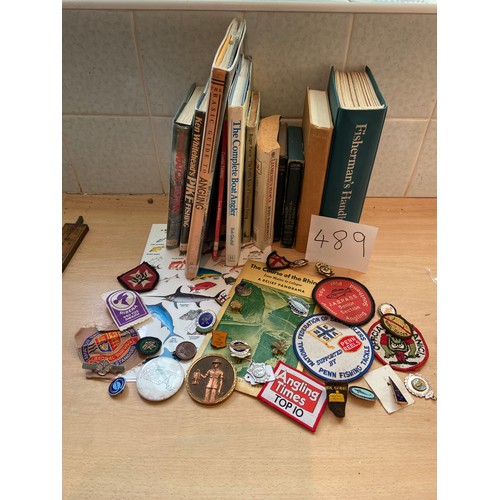 489 - Fishing books, badges etc