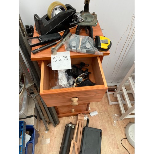 523 - Wooden 4 drawer cabinet with optical tools, easels, roller, tool box etc