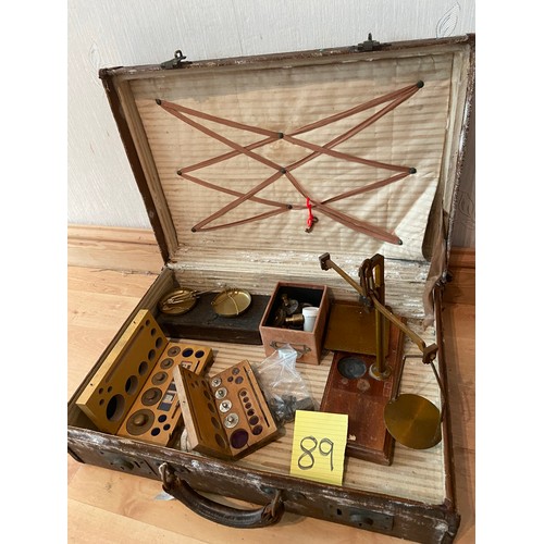 89 - A suitcase of scales, weights etc