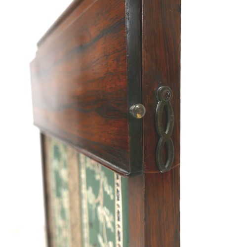 651 - A William IV rosewood fire screen with single drop-leaf section to one side, Chinese embroidered pan... 