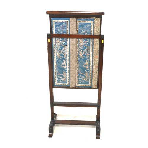 651 - A William IV rosewood fire screen with single drop-leaf section to one side, Chinese embroidered pan... 