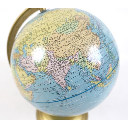 121 - A 10 1/2 inch Scholastic world globe.