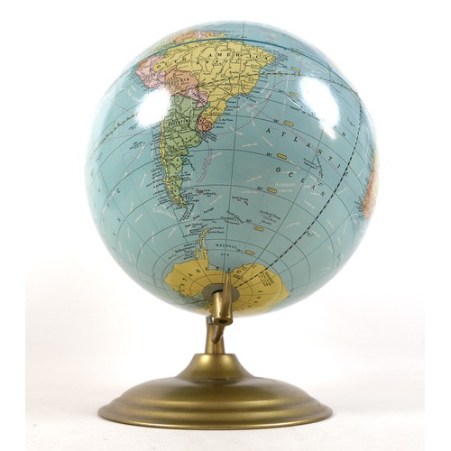 121 - A 10 1/2 inch Scholastic world globe.