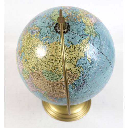 121 - A 10 1/2 inch Scholastic world globe.