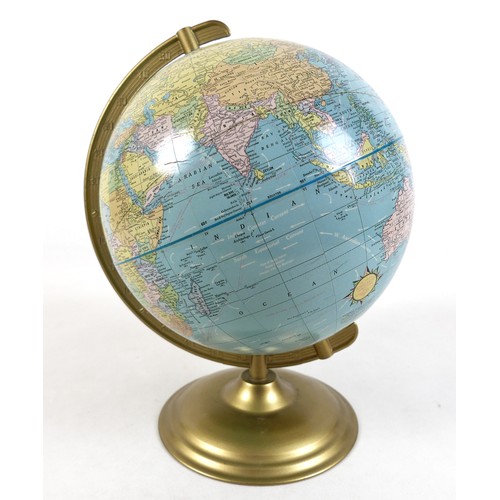 121 - A 10 1/2 inch Scholastic world globe.