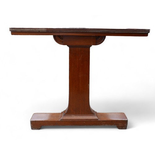 609 - A mahogany library table, with a rectangular top on twin supports having platform bases, 115 by 74 b... 