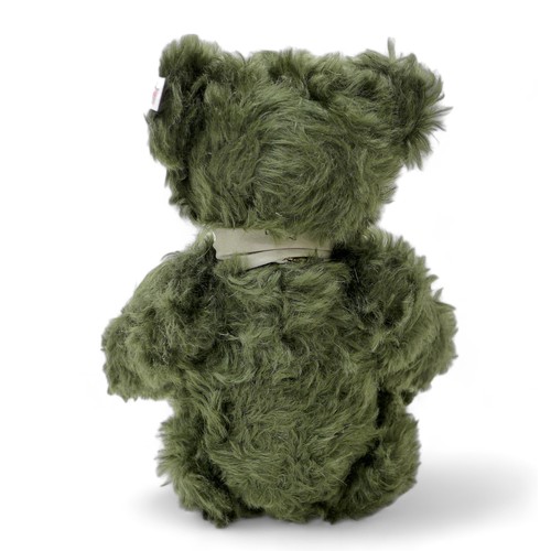 194 - Steiff Teddy Bear Edelweiss Teddy Bear, green mohair, posable five jointed bear standing 38cm tall, ... 