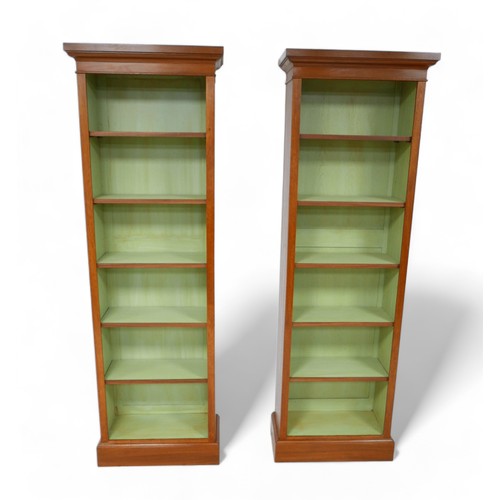 645 - A pair of full new height walnut bookcases with painted interior and five adjustable shelves, 56.5cm... 