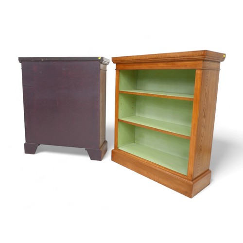 643 - A pair new of burr oak open bookcases with painted interior and two adjustable shelves, 80cm by 30cm... 