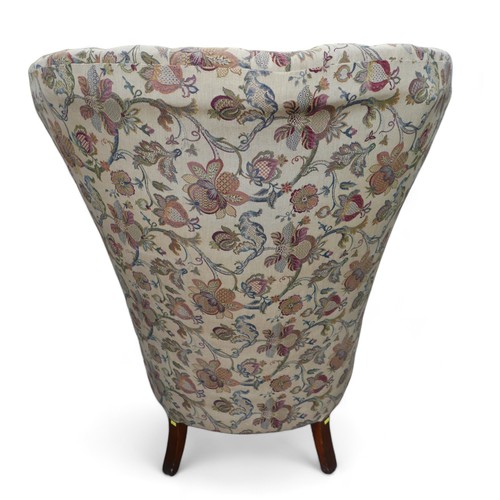 616 - An early 19th century mahogany fan back library chair upholstered in a regency style foliate fabric,... 