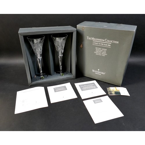 73 - Waterford Crystal a pair of Millennium collection toasting flutes, boxed.